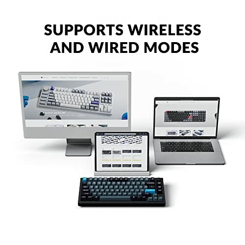 Wireless and wired keyboard setup with computer, laptop, and tablet.